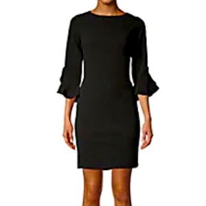Ruffle-cuffed sheath dress.